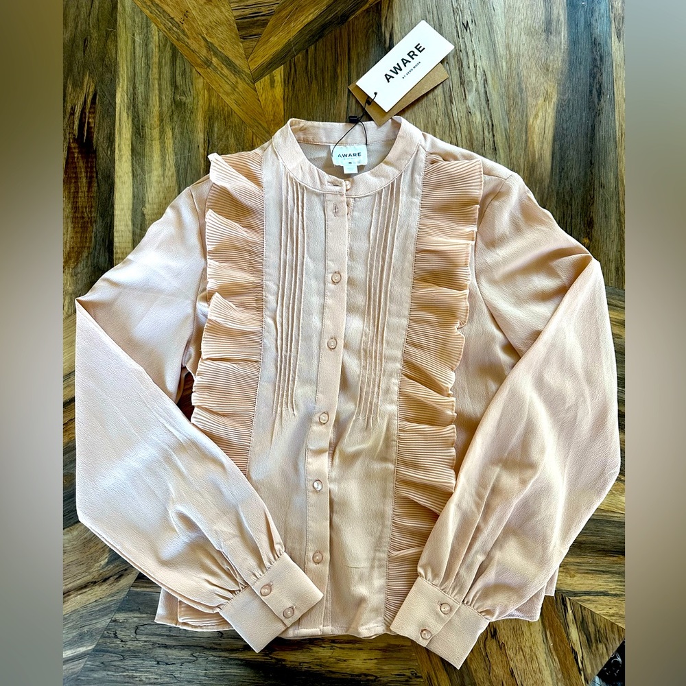 Light mauve pink ruffled blouse